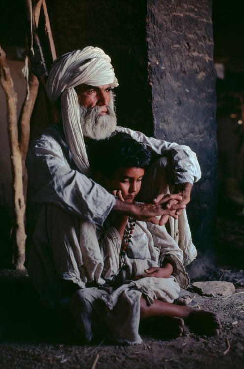 Father-And-Son-In-Helmand-Province-1980-by-Steve-Mccurry-C400074