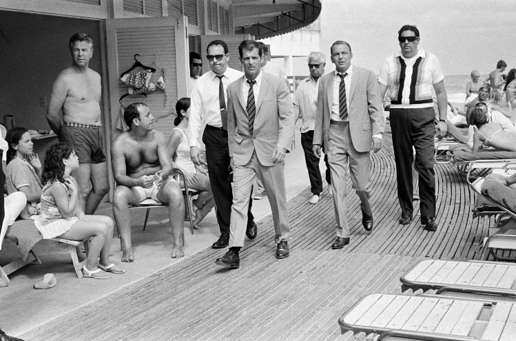 Frank Sinatra with his Stand-In and Bodyguards Arriving on Location, Miami Beach, 1968