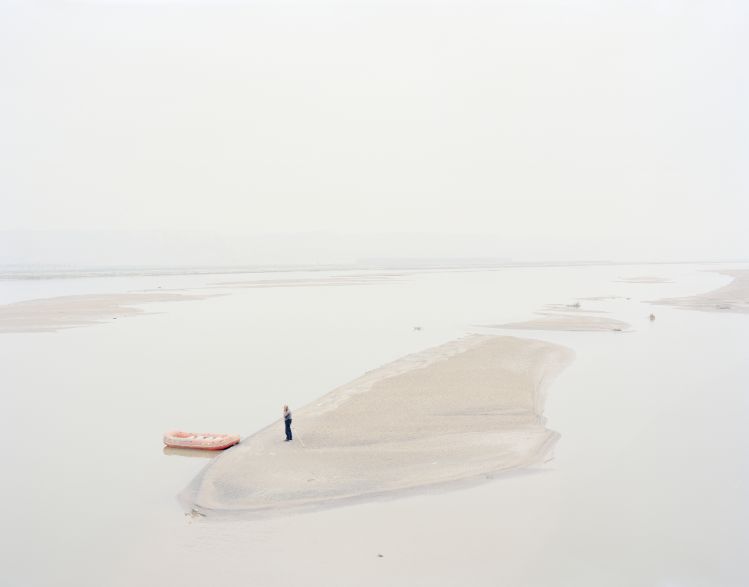 A Man Standing on an Island in the Middle of the River, Shaanxi, 2012 Zhang Kechun