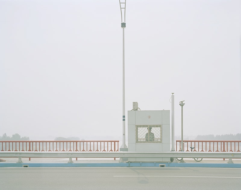 A Man Standing Guard for a Bridge on the Yellow River, Shandong, 2011 Zhang Kechun
