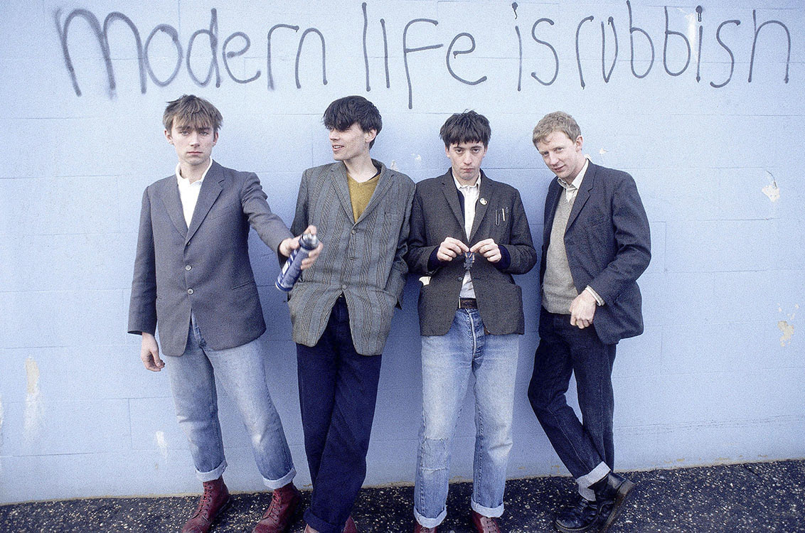 Kevin Cummins, 'Blur in front of the graffiti slogan Modern Life is Rubbish, the title of their 1993 album.'