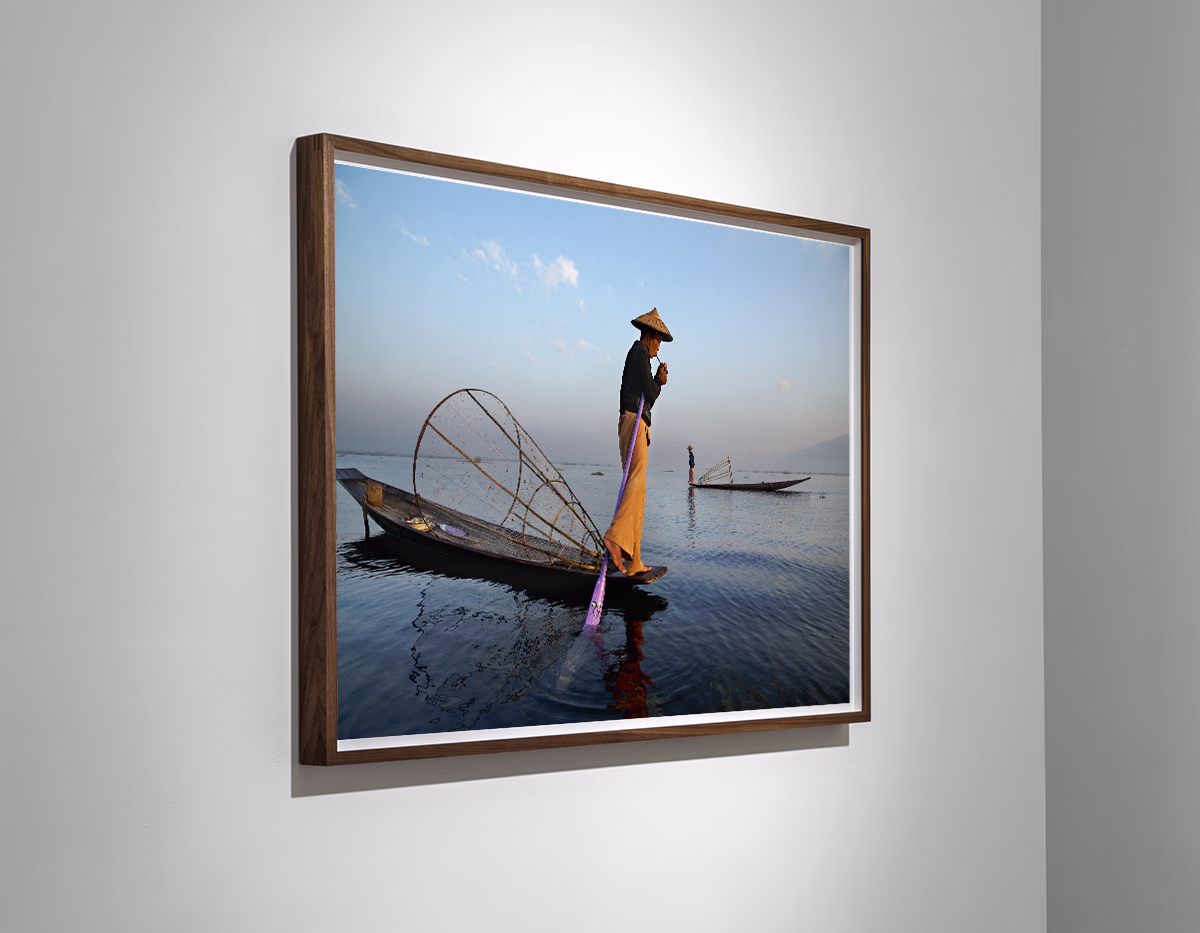 Steve McCurry, 'Fisherman Lights Cigarette on Boat, Burma, 2014'