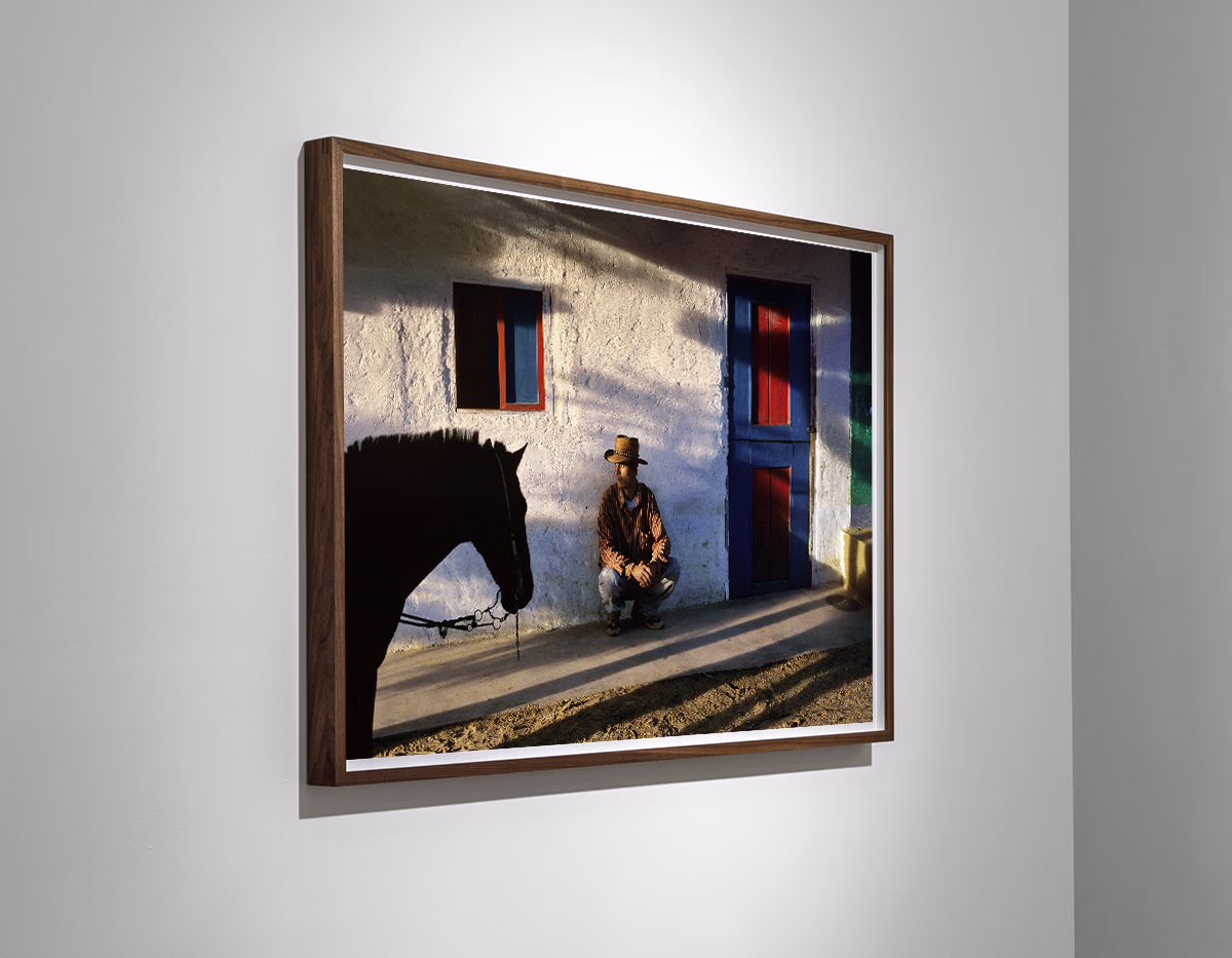 Steve McCurry, 'Javier Joven Penangos Waits by Wall, Colombia, 2004'