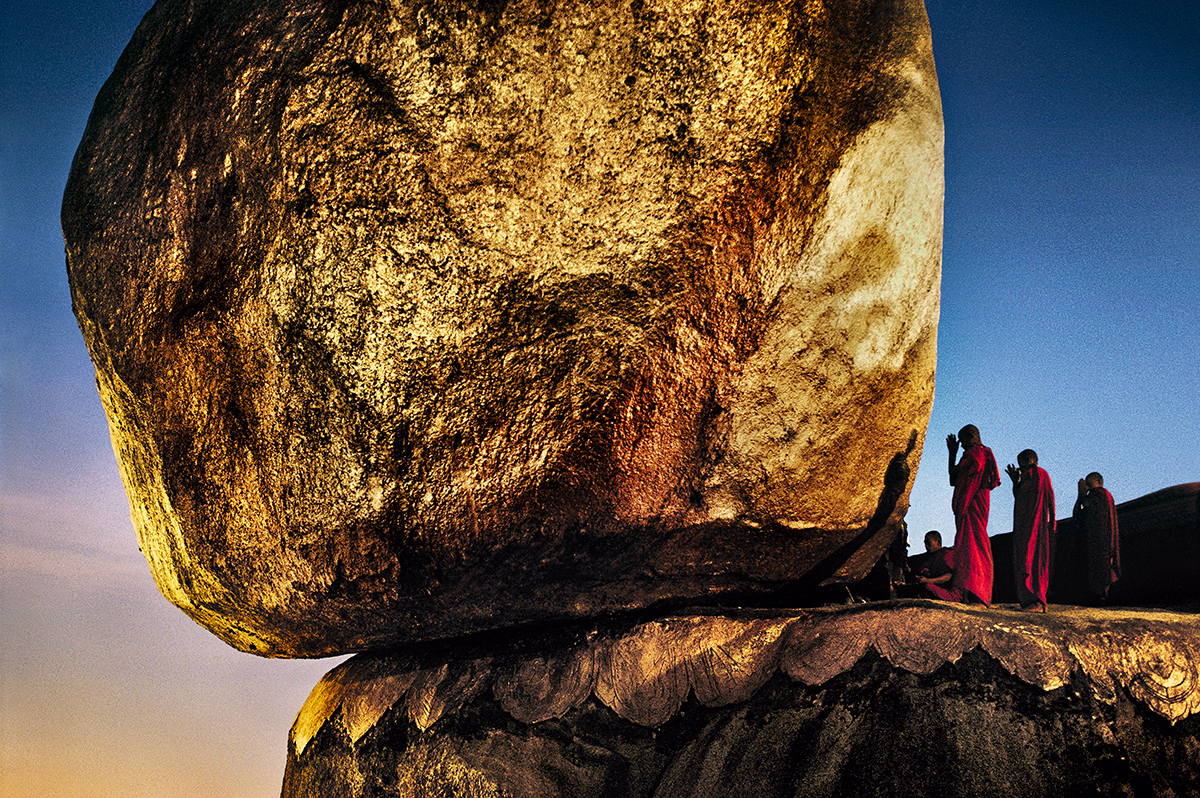 Steve McCurry, 'Monks Praying at Golden Rock, Burma, 1994'
